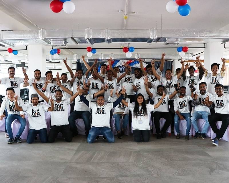 A group of people posing for a photo