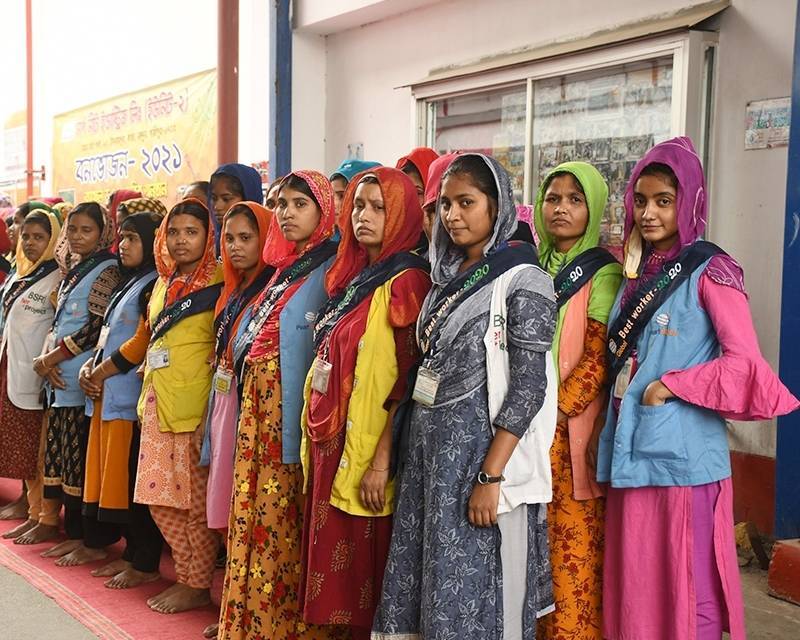 A group of women standing in a line